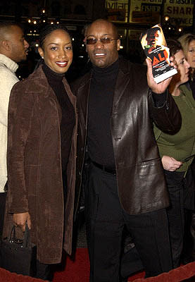 John Singleton and gal at the Hollywood premiere of Ali