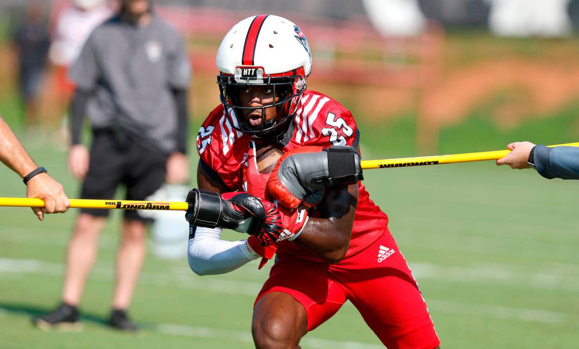 N.C. State cornerback Shyheim Battle (25) runs drills during the Wolfpack’s first practice of fall camp in Raleigh, N.C., Wednesday, August 3, 2022.