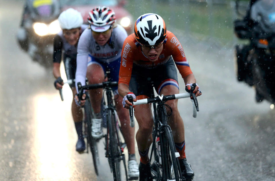 LONDON, ENGLAND - JULY 29: Olga Zabelinskaya (C) of Russia, Elizabeth Armitstead (L) of Great Britain and Marianne Vos (R) of Netherlands break away from the pack during the Women's Road Race Road Cycling Day 2 of the London 2012 Olympic Games on July 29, 2012 in London, England. (Photo by Stefano Rellandini - IOPP Pool Getty Images)