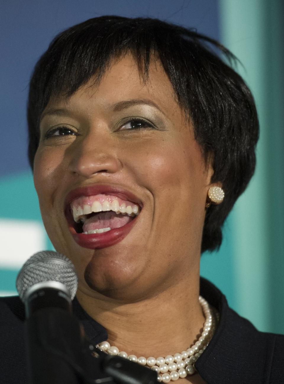 D.C. Mayoral candidate, and Council Member Muriel Bowser addresses her supporters at her election night watch party to await the Democrate Primary results in Washington, Tuesday, April 1, 2014. (AP Photo/Cliff Owen)