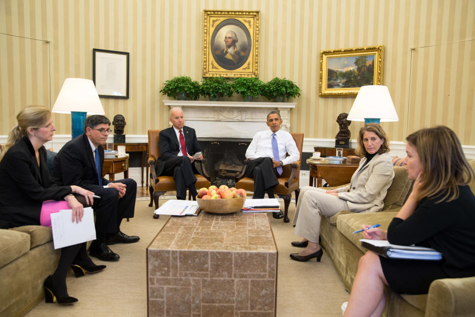 WASHINGTON, DC - OCTOBER 1: In this handout image provided by the White House, U.S. President Barack Obama (3R) and Vice President Joe Biden (3L) listen as they are updated on the federal government shutdown and the approaching debt ceiling deadline by (L-R) Kathryn Ruemmler, Counsel to the President, Treasury Secretary Jack Lew, Sylvia Mathews Burwell, Director of OMB, and Alyssa Mastromonaco, Deputy Chief of Staff, in the Oval Office October 1, 2013 in Washington, DC. House Republicans and Senate Democrats continue to volley legislation back and forth as they battle over a budget to keep the government running and delaying or defunding 'Obamacare.'  (Photo by Pete Souza/The White House via Getty Images)