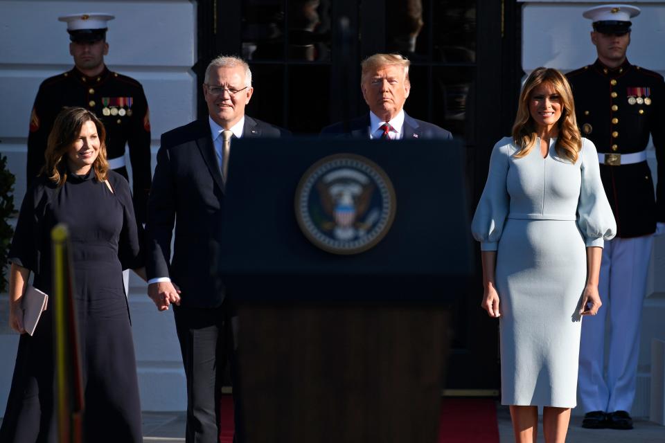 President Donald Trump and first lady Melania Trump welcome Australian Prime Minister Scott Morrison and his wife Jenny Morrison during a state arrival ceremony on the South Lawn of the White House, Sept. 20, 2019.