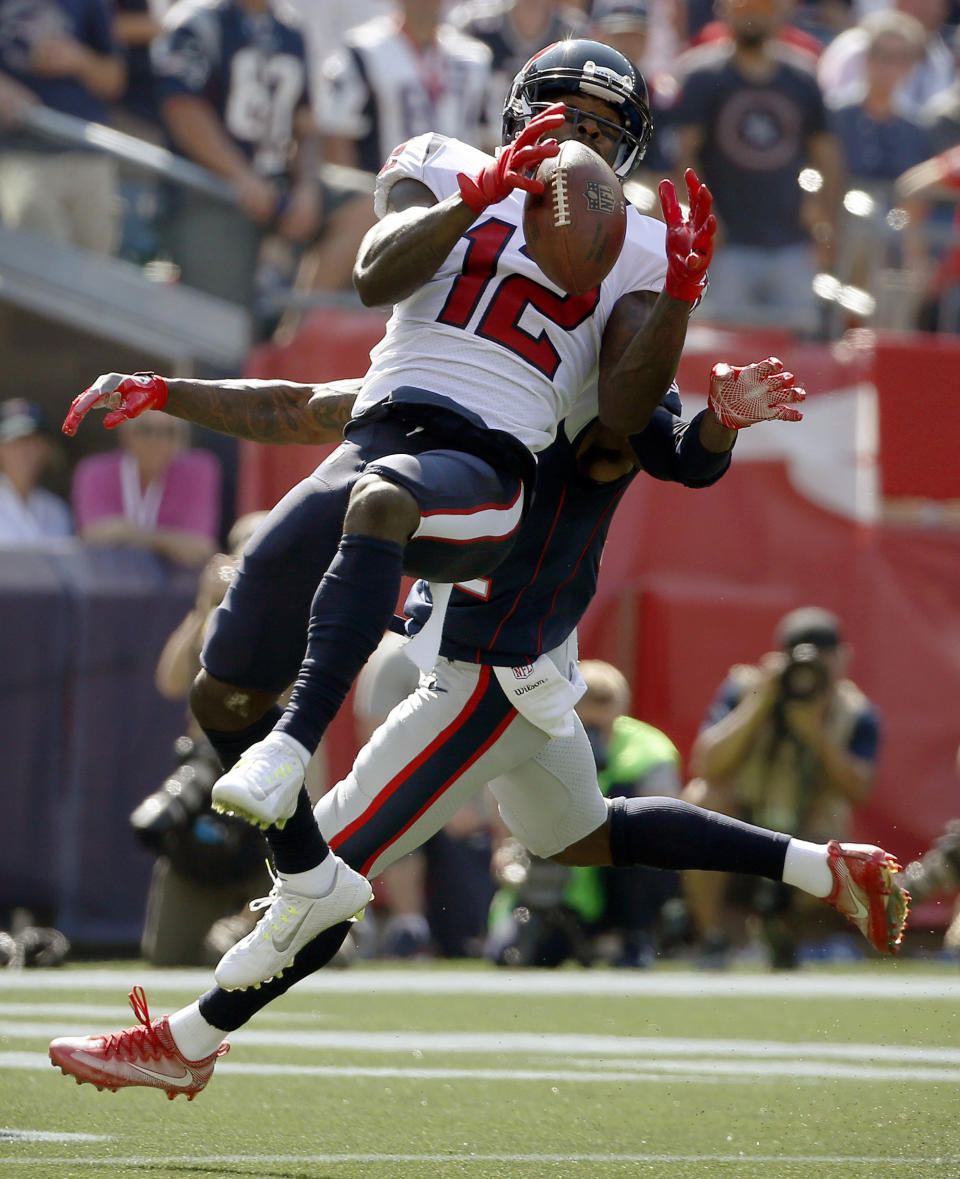 <p>Houston Texans wide receiver Bruce Ellington (12) catches a touchdown pass in front of New England Patriots cornerback Jonathan Jones during the first half of an NFL football game, Sunday, Sept. 24, 2017, in Foxborough, Mass. (AP Photo/Michael Dwyer) </p>