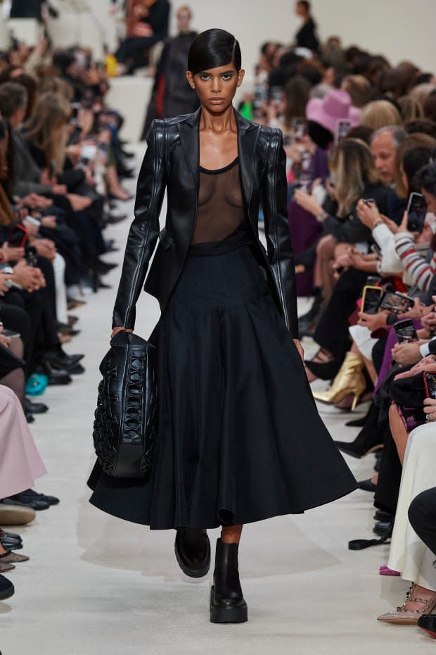 <p><strong>Black:</strong> "We saw loads of strong full-black looks on the runway; best interpretations are from Saint Laurent, Balenciaga and Valentino (pictured)."</p>