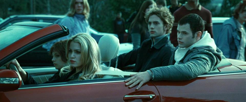 Ashley Greene as Alice, Nikki Reed as Rosalie, Jackson Rathbone as Jasper, and Kellan Lutz as Emmett.