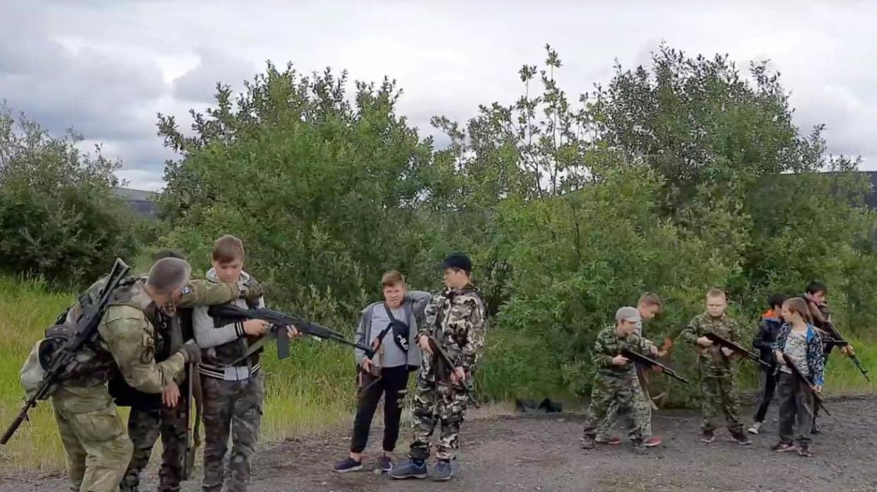 Russian children are trained to shoot assault rifles and weave camouflage nets. Photo: Thomas Nilsen on X (Twitter)