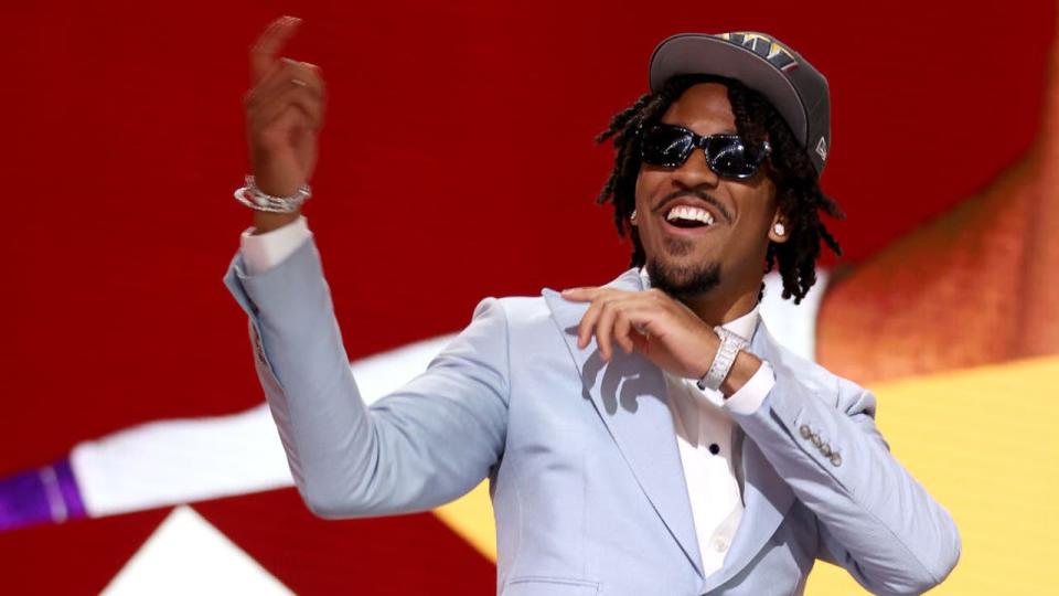 <div>DETROIT, MICHIGAN - APRIL 25: Jayden Daniels celebrates after being selected second overall by the Washington Commanders during the first round of the 2024 NFL Draft at Campus Martius Park and Hart Plaza on April 25, 2024 in Detroit, Michigan. (Photo by Gregory Shamus/Getty Images)</div>