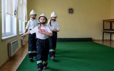 The all-girl young volunteer firefighters team - Credit: Kasia Strek/NYTNS / Redux / eyevine&nbsp;