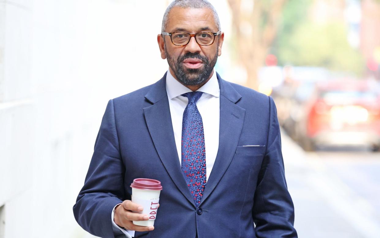 James Cleverly, the shadow home secretary, is pictured this morning in Westminster