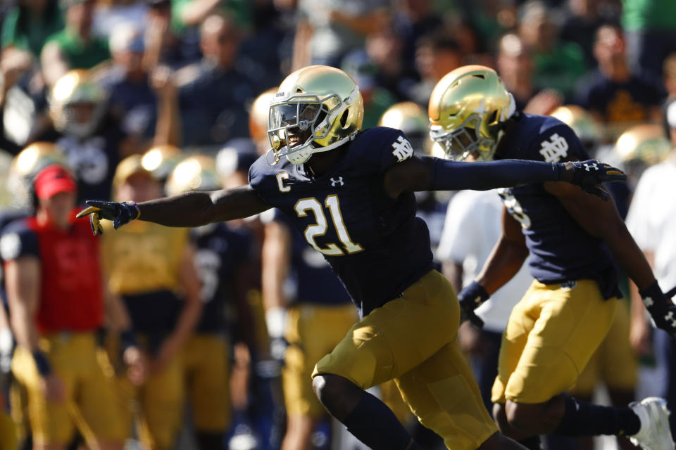 Notre Dame safety Jalen Elliott (21) celebrates an interception against New Mexico in the first half of an NCAA college football game in South Bend, Ind., Saturday, Sept. 14, 2019. (AP Photo/Paul Sancya)