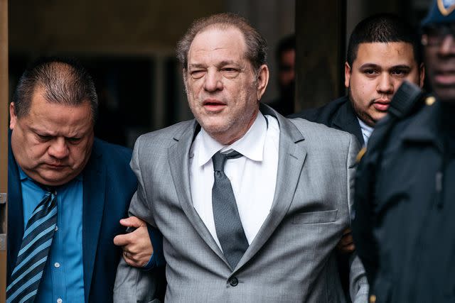 <p>Scott Heins/Getty</p> Harvey Weinstein leaves New York City Criminal Court after a bail hearing on December 6, 2019 in New York City.