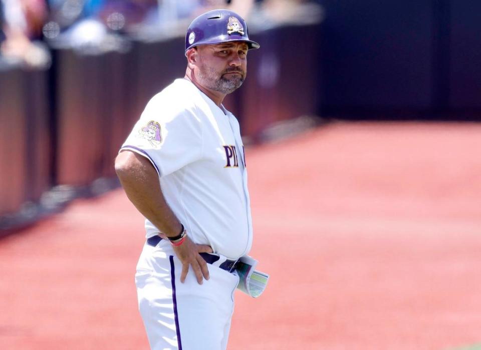 East Carolina coach Cliff Godwin watches during ECUs game against Texas in the Greenville Super Regional at Clark-LeClair Stadium Friday, June 10, 2022.