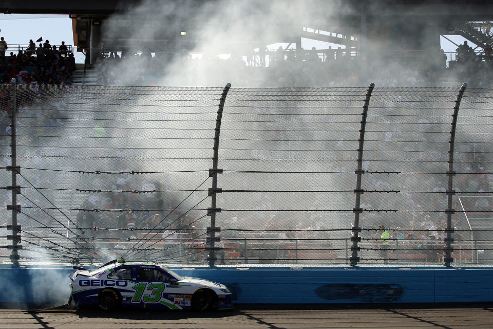 AVONDALE, AZ - MARCH 04: Casey Mears, driver of the #13 GEICO Ford, crashes into the wall during the NASCAR Sprint Cup Series SUBWAY Fresh Fit 500 at Phoenix International Raceway on March 4, 2012 in Avondale, Arizona. (Photo by Christian Petersen/Getty Images)