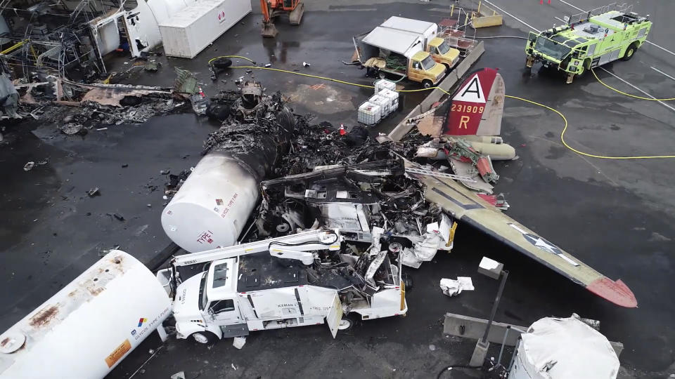 This image taken from video provided by National Transportation Safety Board shows damage from a World War II-era B-17 bomber plane that crashed Wednesday at Bradley International Airport, Thursday, Oct. 3, 2019 in Windsor Locks, Conn. The plane crashed and burned after experiencing mechanical trouble on takeoff Wednesday morning from Bradley International Airport. (NTSB via AP)