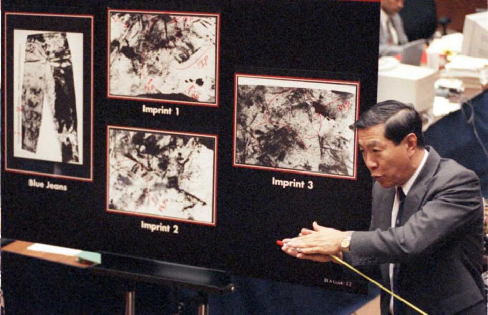 <div class="inline-image__caption"><p>Henry Lee explains to the jury possible shoe imprints on murder victim Ron Goldman's blood-stained jeans during direct examination by defense attorney Barry Scheck in the O.J. Simpson trial. The defense was trying to prove that the imprints were from a second assailant.</p></div> <div class="inline-image__credit">Getty</div>