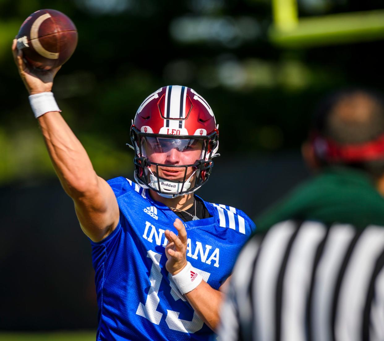 Indiana's Brendan Sorsby (15) throws a pass during fall football camp at Indiana University on Thursday, Aug. 11, 2022.