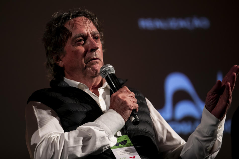 Belgian filmmaker Jean-Pierre Dutilleux and director of the documentary "Raoni: An Unusual Friendship," speaks during the screening of the film during the Rio de Janeiro Int'l Film Festival, in Rio de Janeiro, Brasil, Tuesday, Oct. 10, 2023. For five decades, the Amazonian tribal Chief Raoni Metuktire and Dutilleux enlisted presidents and royals, even Pope Francis, to improve the lives of Brazil’s Indigenous peoples and protect their lands. Behind the scenes, however, the relationship was nearing its end. Not long after returning to Brazil in May 2024, the chief of the Kayapo severed ties with his Belgian acolyte. (AP Photo/Bruna Prado)