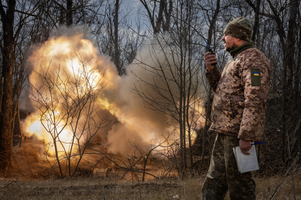 FILE - A Ukrainian officer observes the firing of a 152-mm Self-Propelled Howitzer 2S3, towards Russian positions at the frontline, near Bakhmut, Donetsk region, Ukraine, Monday, March 25, 2024. (AP Photo/Efrem Lukatsky, File)