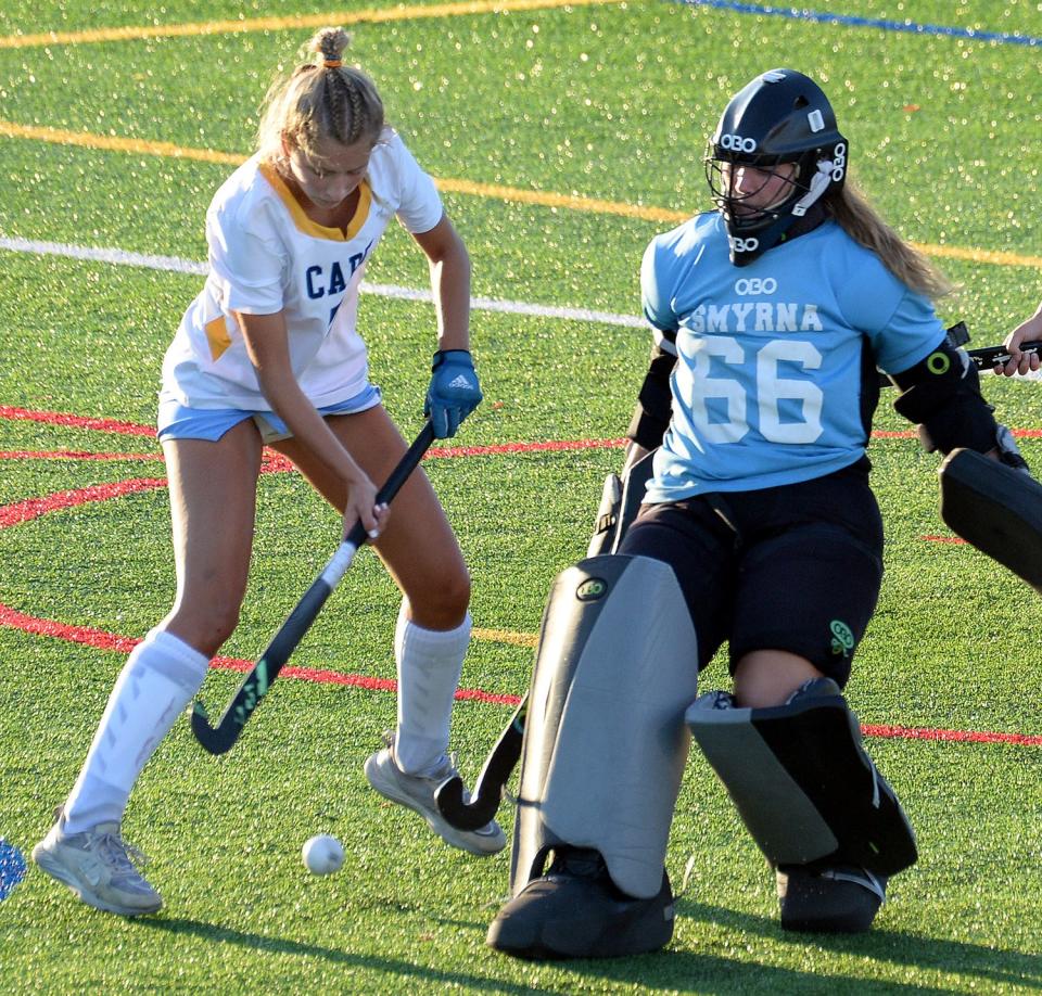 Smyrna goalkeeper Halle Geiger comes out to block shot attempt by Macy Steinwedel of Cape Henlopen during the Eagles 2-1 victory on Thursday September 14, 2023.