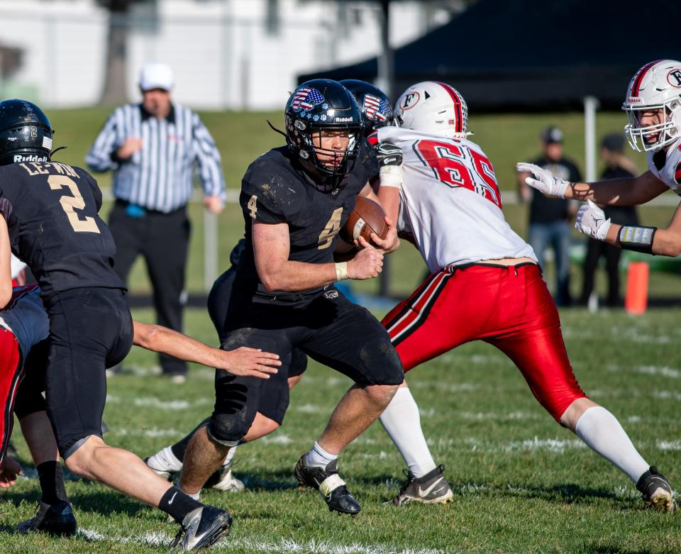 Lena-Winslow's Gage Dunker runs for his 69th career touchdown setting an NUIC record during the third quarter of the Class 1A Round 2 playoff game on Saturday, Nov. 4, 2023, in Lena.