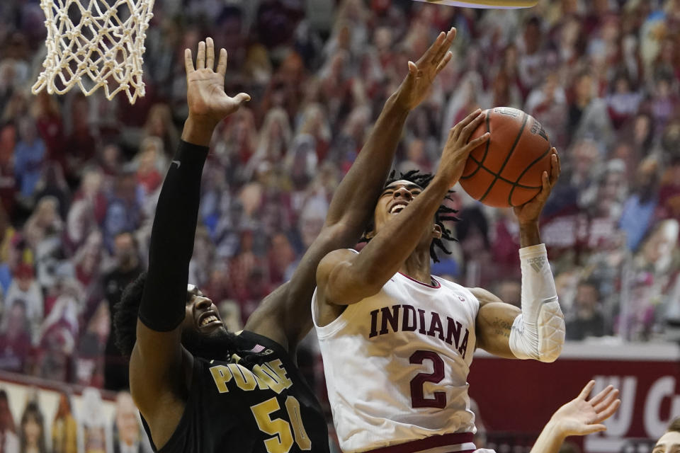 Indiana's Armaan Franklin (2) puts up a shot against Purdue's Trevion Williams (50) during the second half of an NCAA college basketball game, Thursday, Jan. 14, 2021, in Bloomington Ind. Purdue won 81-69. (AP Photo/Darron Cummings)