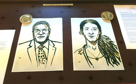 Drawings of the Nobel Peace Prize winners Denis Mukwege and Nadia Murad are displayed in Oslo, Norway October 5, 2018. REUTERS/Nerijus Adomaitis