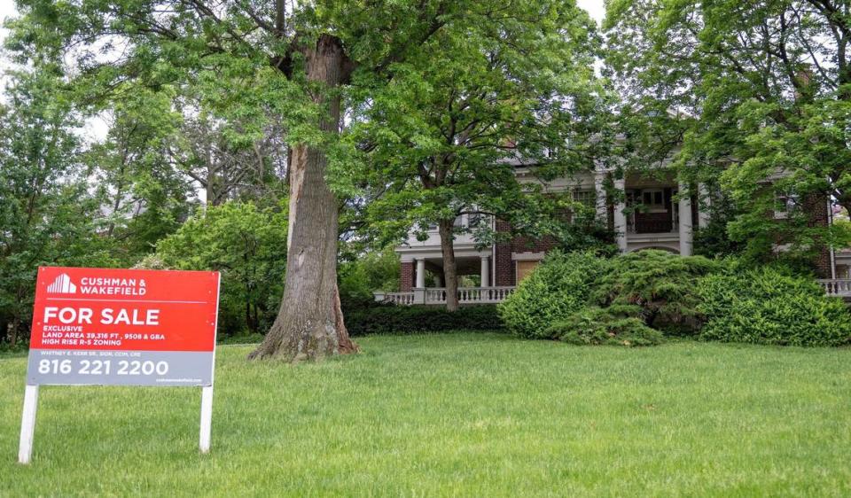 The “For Sale” sign outside the stately home at 4526 Warwick Blvd. suggests the property could be used for a future “high rise.” Neighbors want the home saved and put on Kansas City’s Register of Historic Places.