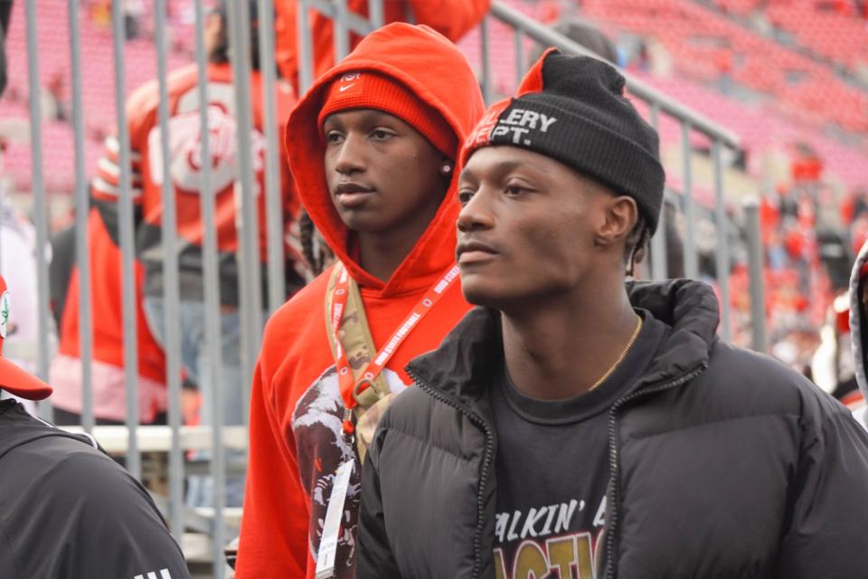 Ohio State 2023 TE commit Jelani Thurman walks off the field at Ohio Stadium with 2023 WR commit Carnell Tate.