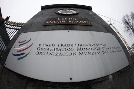 File photo of the World Trade Organization logo seen at the entrance of the headquarters in Geneva April 9, 2013. REUTERS/Ruben Sprich