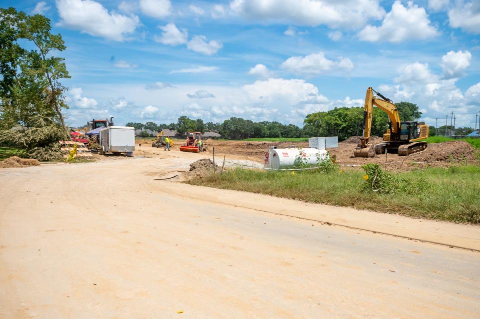 Construction work underway on a detention pond at the Corner of Republic Ave & Lake Farm Road in Lafayette, LA. Tuesday, Aug. 10, 2021.