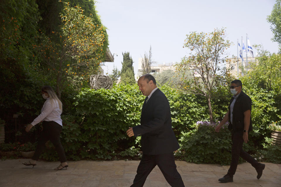 Naftali Bennett, head of the Yamina Party, arrives to meet with Israeli President Reuvin Rivlin in Jerusalem, Wednesday, May 5, 2021. Israel's president on Wednesday signaled he would move quickly to task a new candidate with forming a government after Prime Minister Benjamin Netanyahu failed to do so ahead of a midnight deadline. (AP Photo/Maya Alleruzzo)
