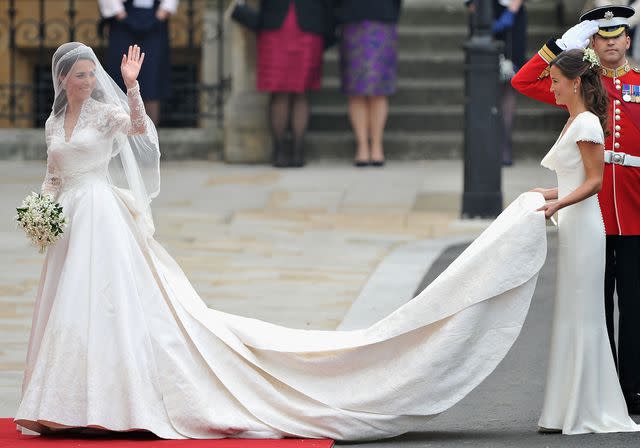 <p>Pascal Le Segretain/Getty</p> Kate Middleton arriving at Westminster Abbey with Pippa Middleton