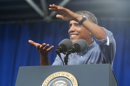 U.S. President Barack Obama delivers remarks at Laborfest 2014 at Maier Festival Park in Milwaukee, Wisconsin September 1, 2014. REUTERS/Jonathan Ernst