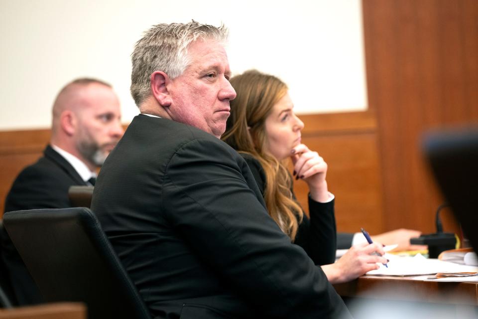 Feb 13 2024; Columbus, Ohio, USA; Defense Attorney Mark Collins looks at the jury while listening to the testimony of expert witness University of South Carolina law professor Seth Stoughton in the trial of Michael Jason Meade at the Franklin County Common Pleas Court.