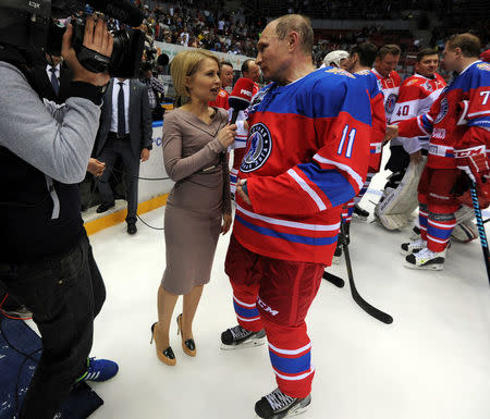 Russian President Vladimir Putin gives an interview as he takes part in a gala game of the Night Ice Hockey League in Sochi, Russia, May 10, 2016. Mikhail Klimentyev/Sputnik/Kremlin via Reuters