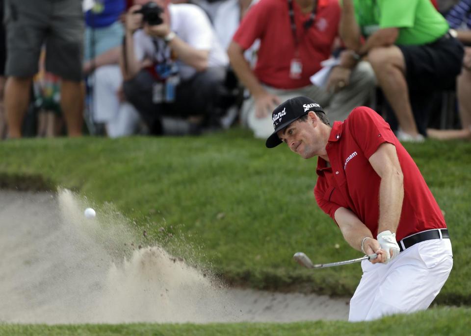 Keegan Bradley blasts from the sand trap on the seventh hole during the final round of the Arnold Palmer Invitational golf tournament at Bay Hill, Sunday, March 23, 2014, in Orlando, Fla. (AP Photo/Chris O'Meara)