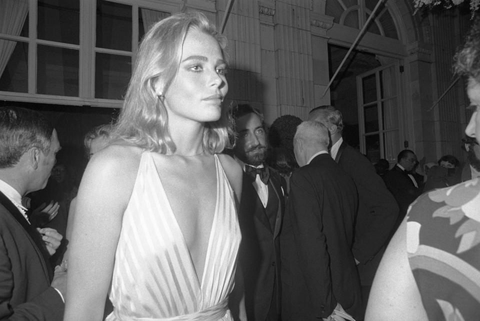 <p>Margaux Hemingway, granddaughter of the late author Ernest Hemingway, shares a close moment with her husband, Errol Watson, during the Tall Ships ball at Rosecliff Manor in Newport, Rhode Island, in 1976.</p>