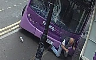 The Number 17 bus throws the unsuspecting pedestrian forwards - Credit: Purple Turtle/SWNS