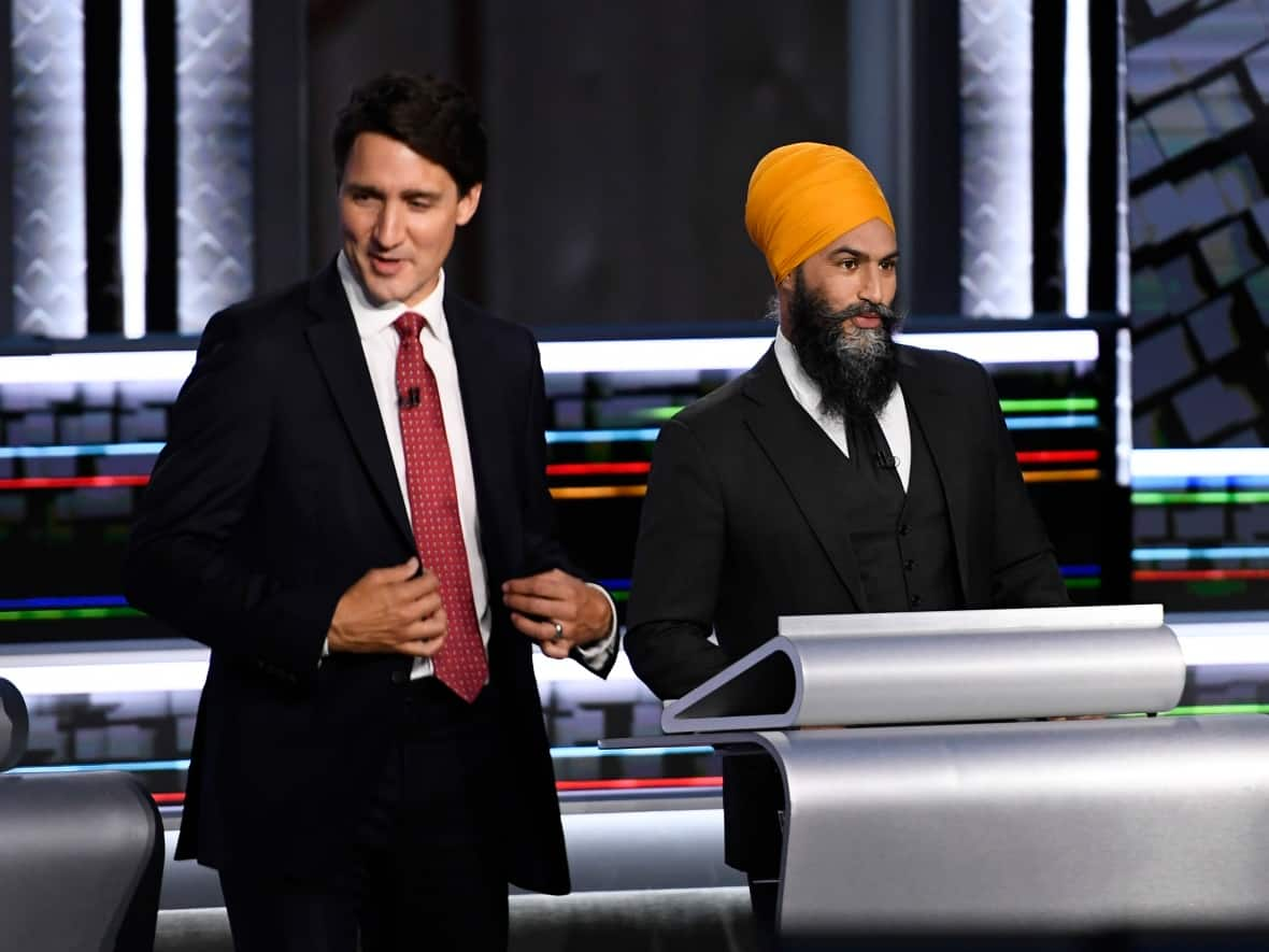 NDP Leader Jagmeet Singh (right) says he has warned Prime Minister Justin Trudeau (left) that his government is running out of time to introduce pharmacare legislation. (Justin Tang/The Canadian Press - image credit)