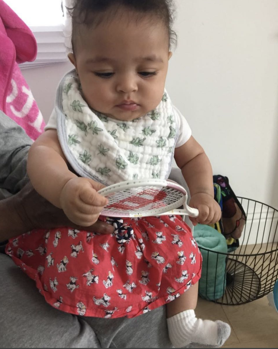 <p>“Olympia Ohanian, at match point, championship point, even without her shoes she’s hard to beat,” the tennis pro captioned this snap of her precious daughter, Alexis Olympia, holding a tiny Wilson tennis racket. “Serving now for her 12th Wimbledon title. 3 more than her mum Serena.” (Photo: <a rel="nofollow noopener" href="https://www.instagram.com/p/BeqOVmUhSES/?taken-by=serenawilliams" target="_blank" data-ylk="slk:Serena Williams via Instagram;elm:context_link;itc:0;sec:content-canvas" class="link ">Serena Williams via Instagram</a>) </p>