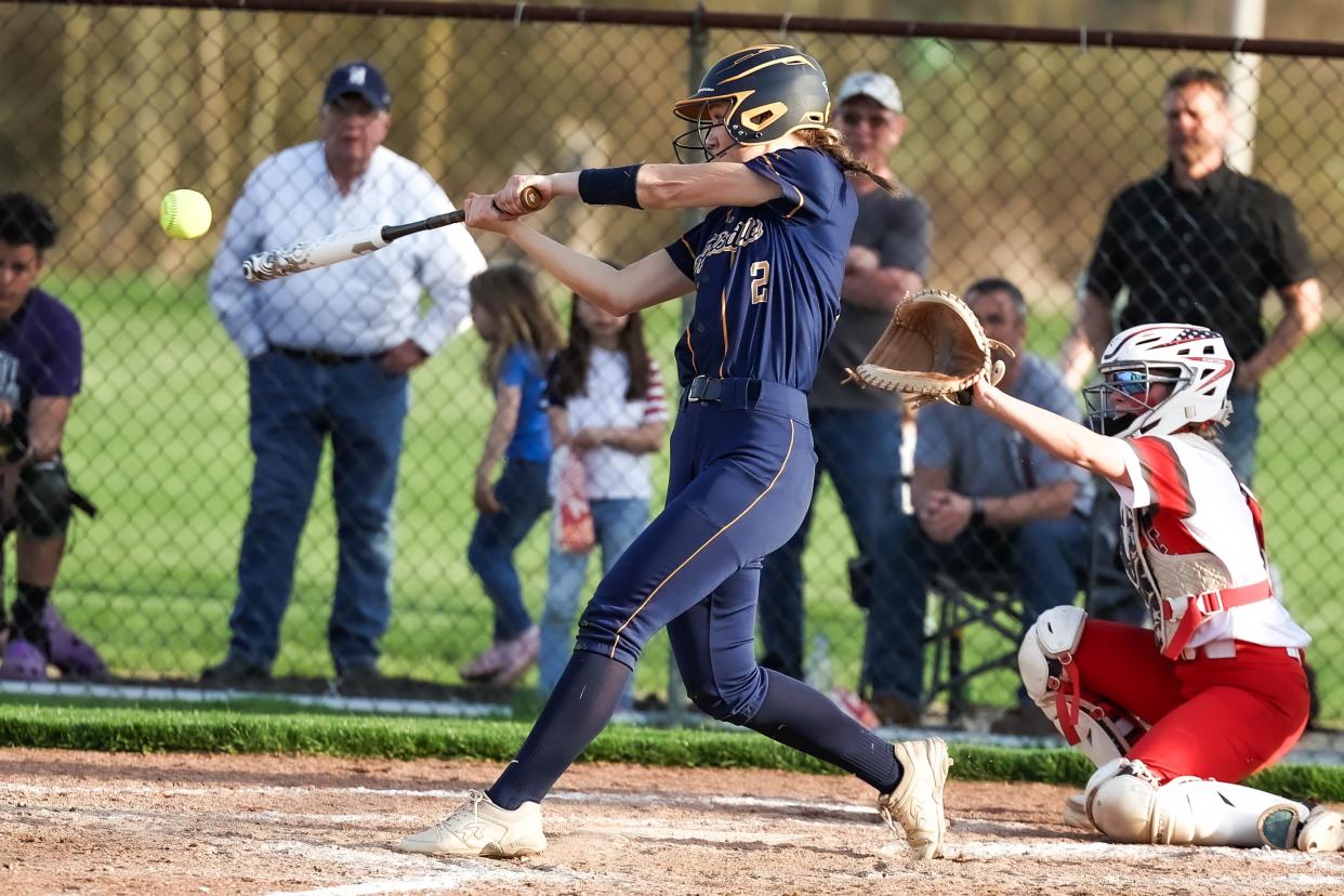 Hillsdale freshman Jordyn Fickes gets all of this pitch here in the seventh inning for a two-run homerun to give her team the 8-5 lead.