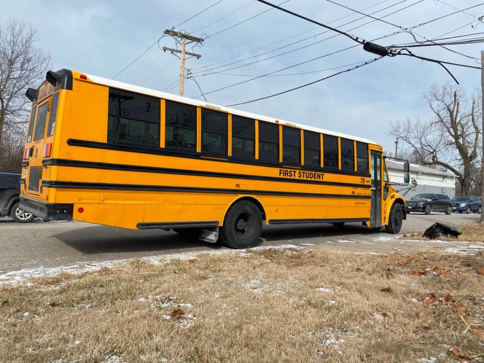 A school bus that brought students from Southern Illinois University Edwardsville to the cleanup served as a warming space for volunteers.