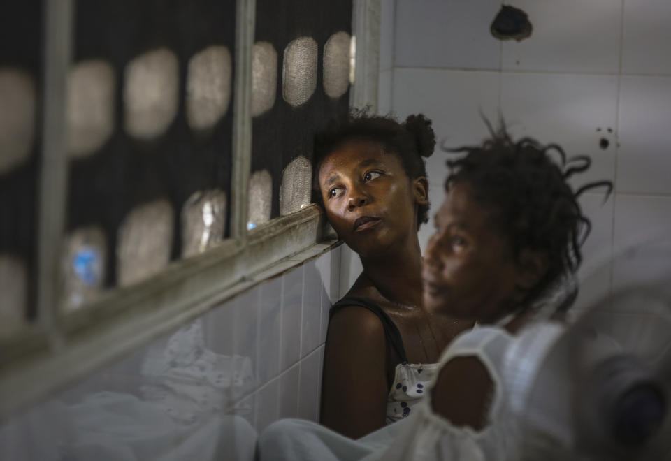 Residents injured during the recent by the 7.2 magnitude earthquake recover at the Immaculee Conception hospital in Les Cayes, Haiti, Thursday, Aug. 19, 2021. (AP Photo/Joseph Odelyn)