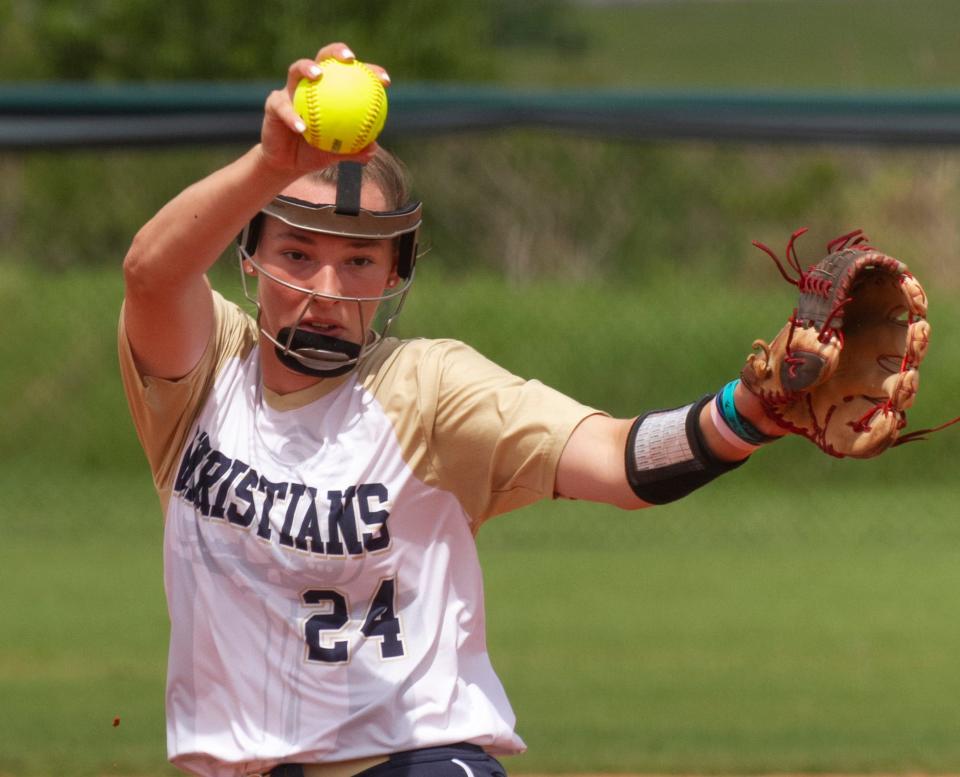 University Christian starting pitcher Sophia Kardatzke (24) winds up during the first inning in the 2023 Class 2A state championship. District tournaments open next week.