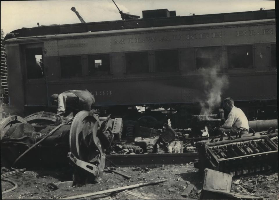 The last stop for the aging, outmoded cars in Milwaukee's rapid transit line was the yard of the Afram Brothers Co., where the cars were cut up for scrap. This photo was published in the Sept. 4, 1951, Milwaukee Journal.