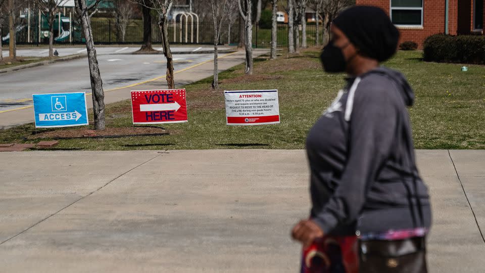 A voter leaves a polling place after casting a primary ballot in Atlanta, Georgia, on March 12, 2024. - Elijah Nouvelage/AFP/Getty Images