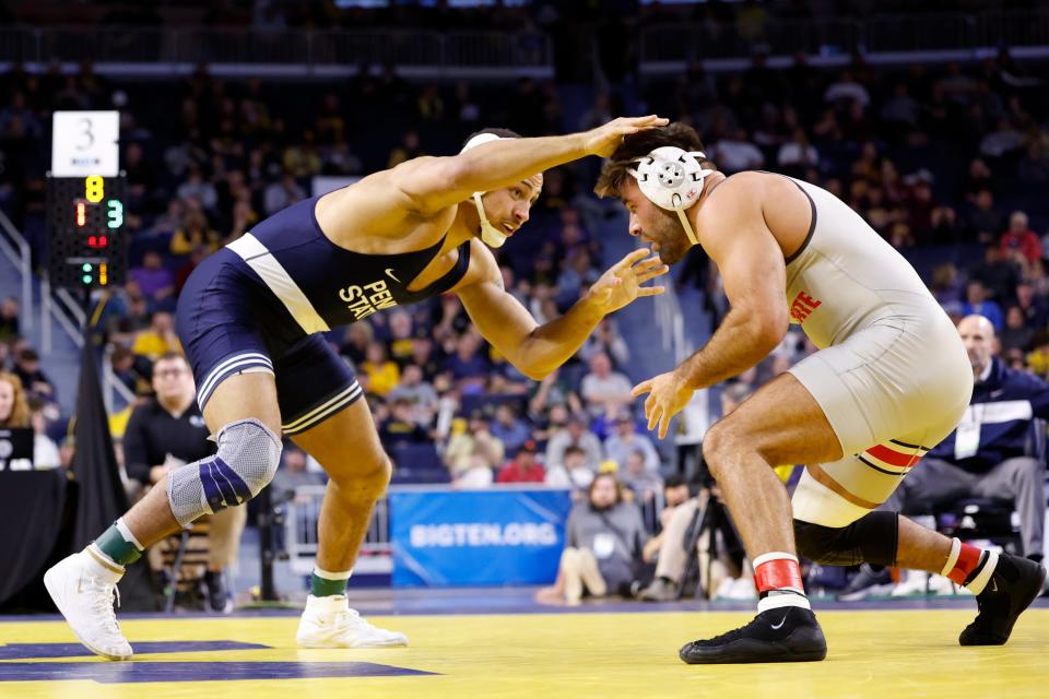 Penn State's Aaron Brooks, left, faces Ohio State's Kaleb Romero in the 184-pound final Sunday at the Big Ten Wrestling Championships in Ann Arbor, Mich. Brooks won by major decision, 12-2.