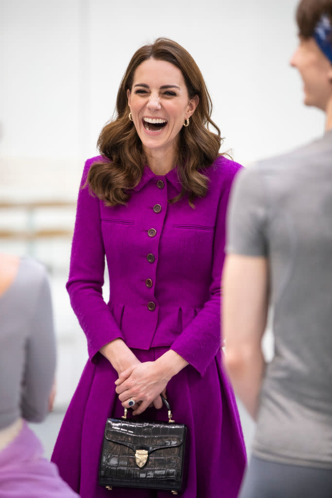 Kate wore her black moc-crock Aspinal of London bag to the Royal Opera House in London. (Getty Images) 