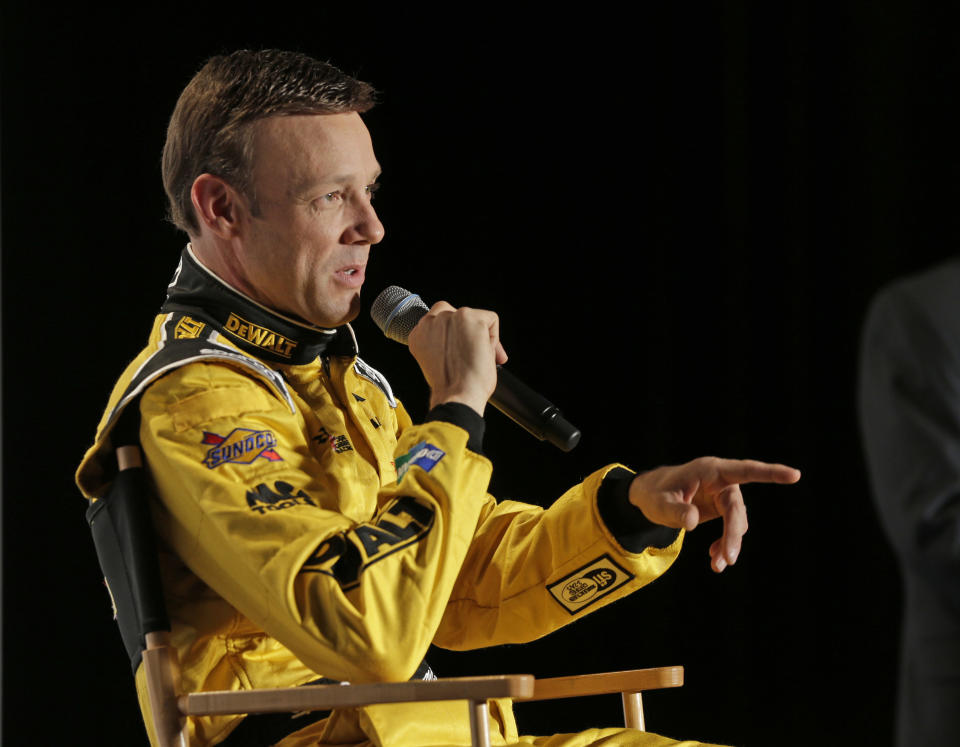 Matt Kenseth answers a question during a news conference at the NASCAR Media Tour in Charlotte, N.C., Tuesday, Jan. 24, 2017. (AP Photo/Chuck Burton)