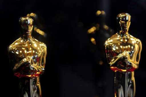 Oscar statuettes are on display during the opening of the "Meet the Oscars, Grand Central" exhibition at Grand Central Station in New York, February 22. Black actresses Viola Davis and Octavia Spencer are Oscar frontrunners, but the reality is that non-whites remain hugely under-represented at the Academy Awards, a new study says